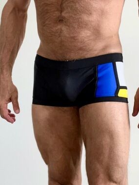Men's Colorblock Mondrian inspired Squarecut swim trunks, front lined.